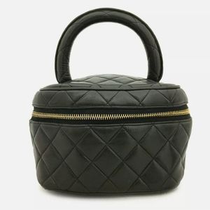 CHANEL Quilted Lambskin Vanity Case